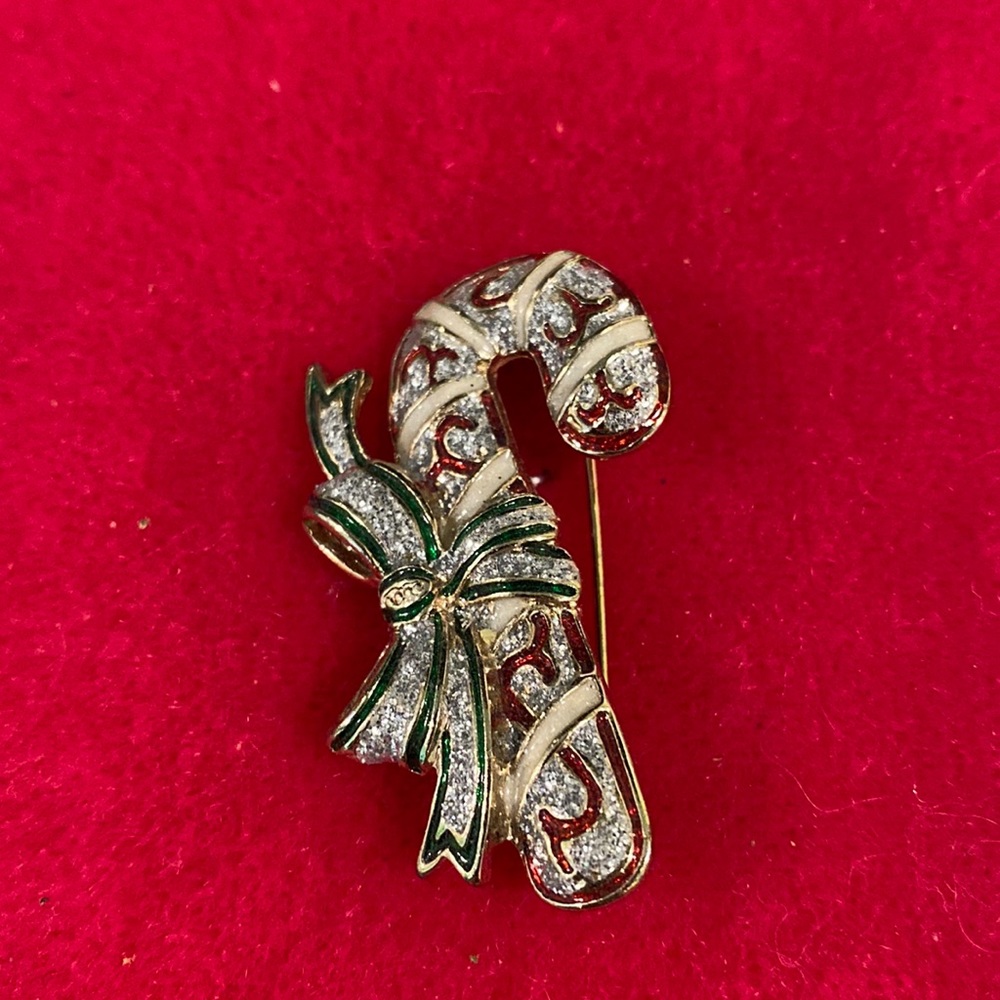 Vintage Holiday candy cane pin. Blingy with green and red enamel